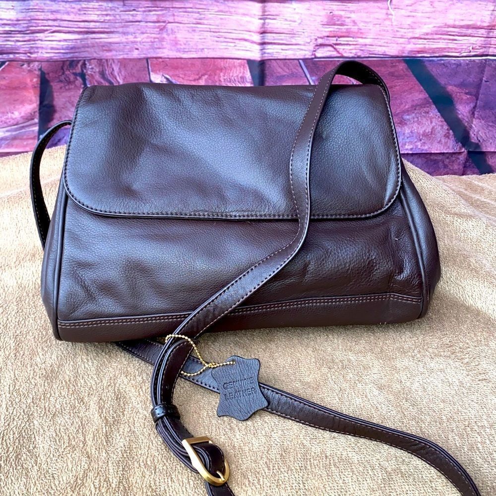 ILIA Leather Crossbody with 3 inside compartments and an outside pocket